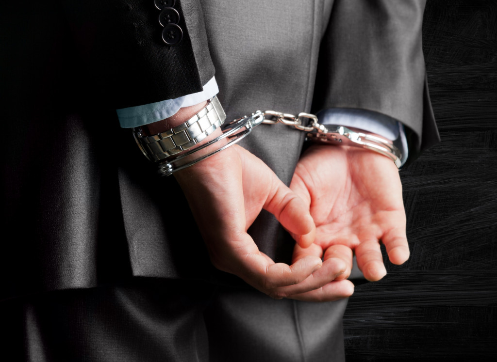 a person with handcuffs